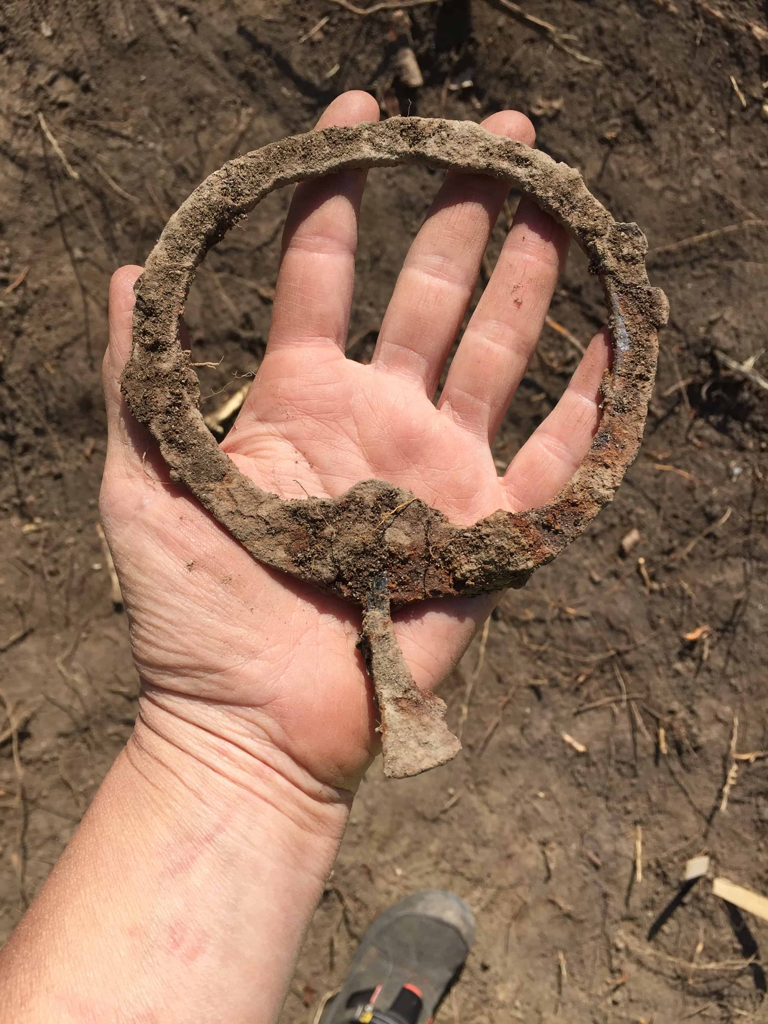 hand holding an old ring