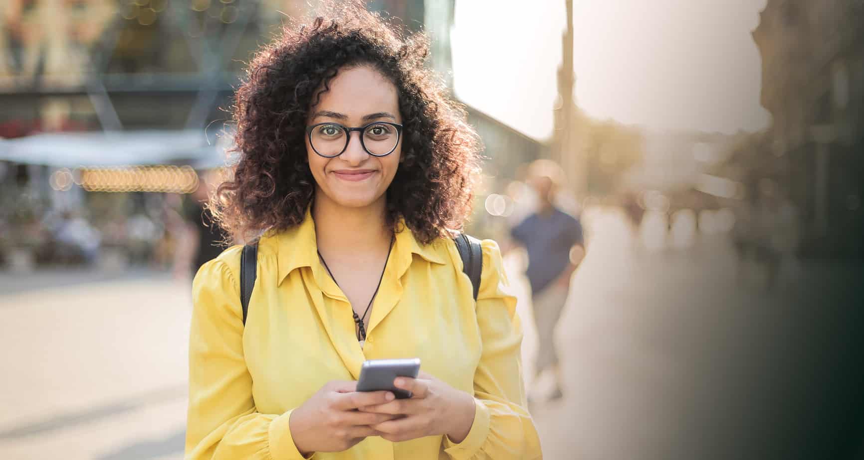 yellow2 woman holding mobile phone